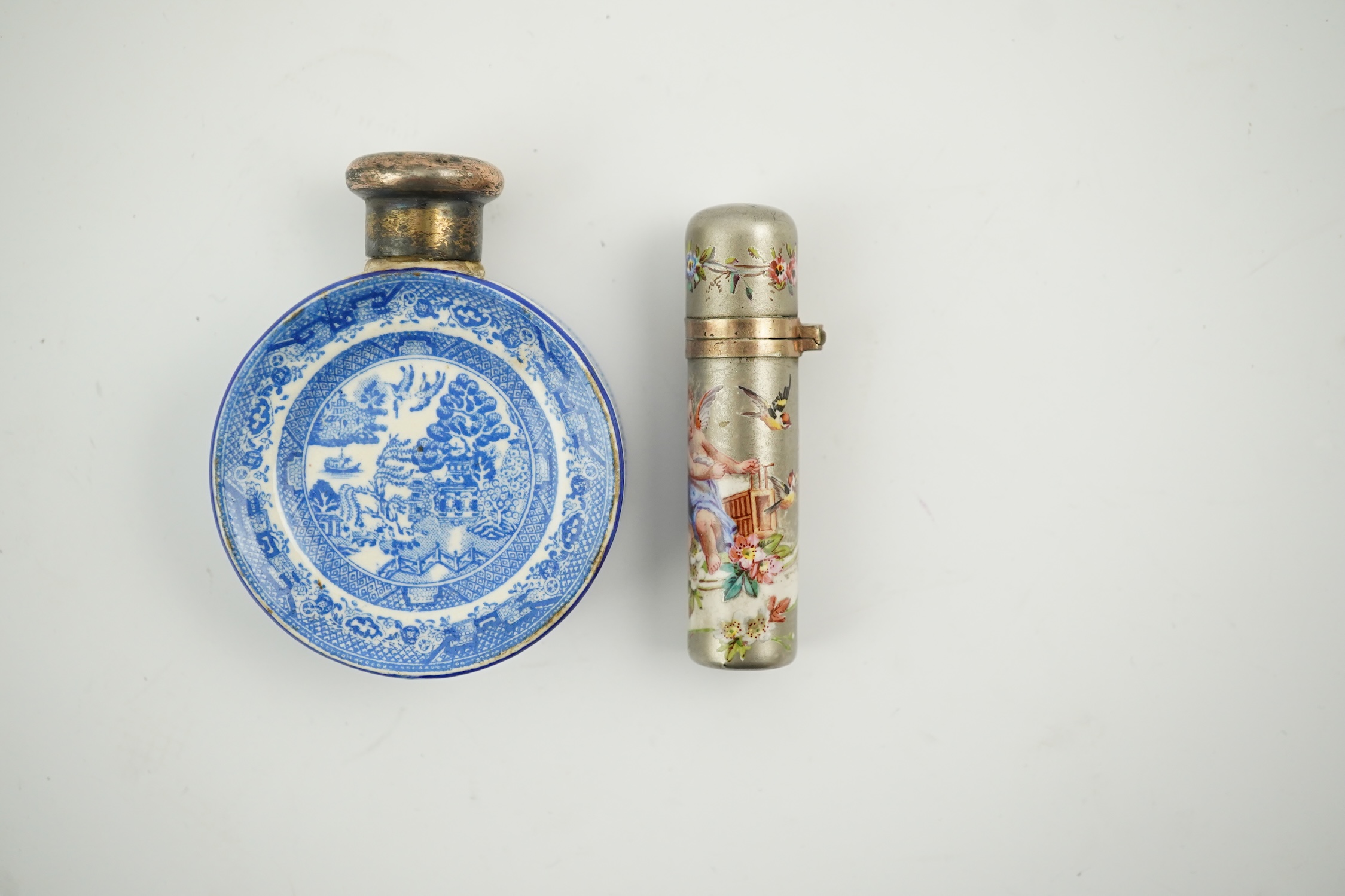 A Victorian white metal and enamel cylindrical scent bottle, 48mm (a.f.) and a late Victorian silver mounted willow pattern scent flask. Condition - poor to fair